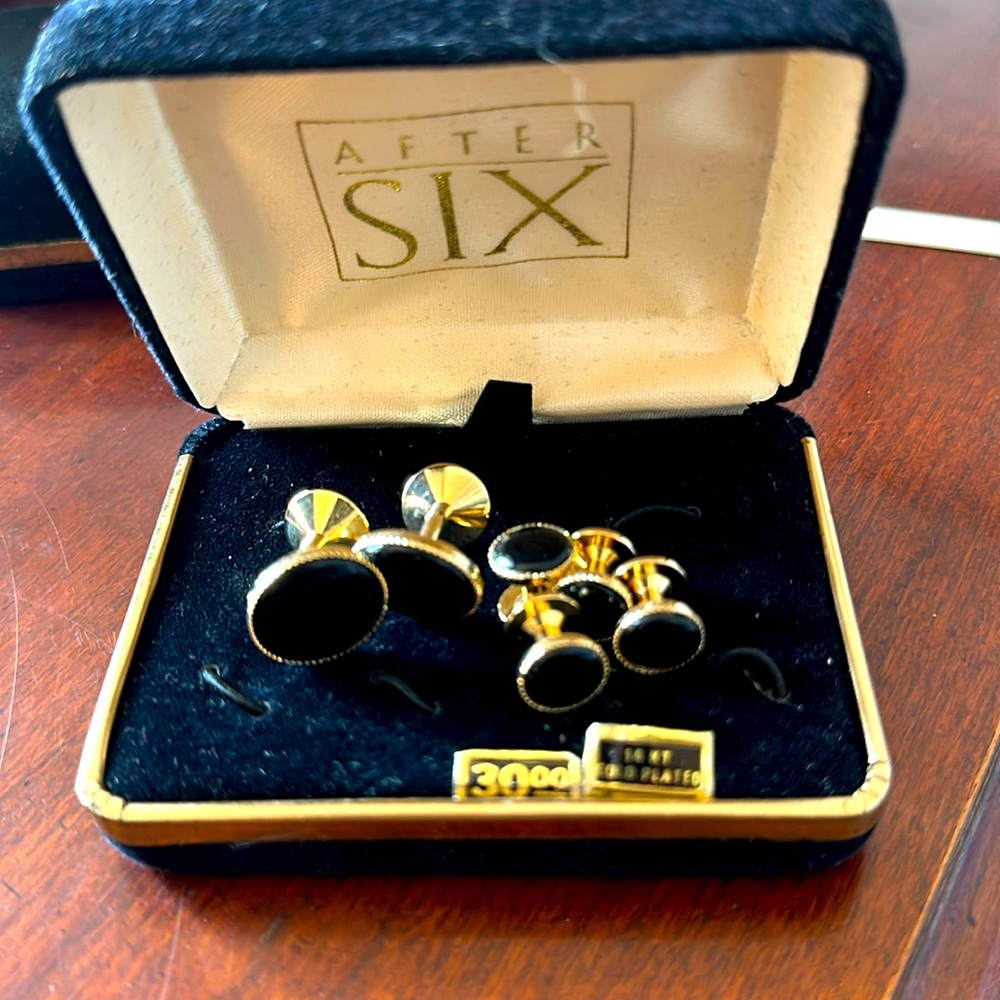 After six cuffkinks and buttons
